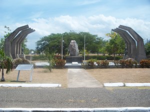 According to the Jamaica National Heritage Trust, the arches of the monument are symbolic of ten fingers and the finish of the arches has been roughened to symbolize hands that toiled during slavery; the centerpiece, a natural Jamaican marble boulder, is a symbol of freedom.